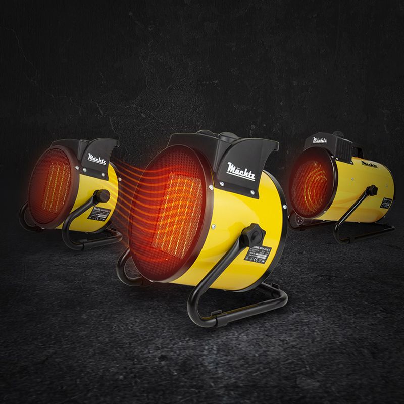 Тепловая пушка Machtz с красным нагревателем на полу.