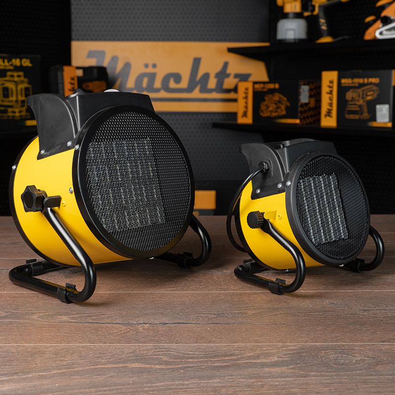 Две тепловые пушки Machtz разного размера на деревянной поверхности