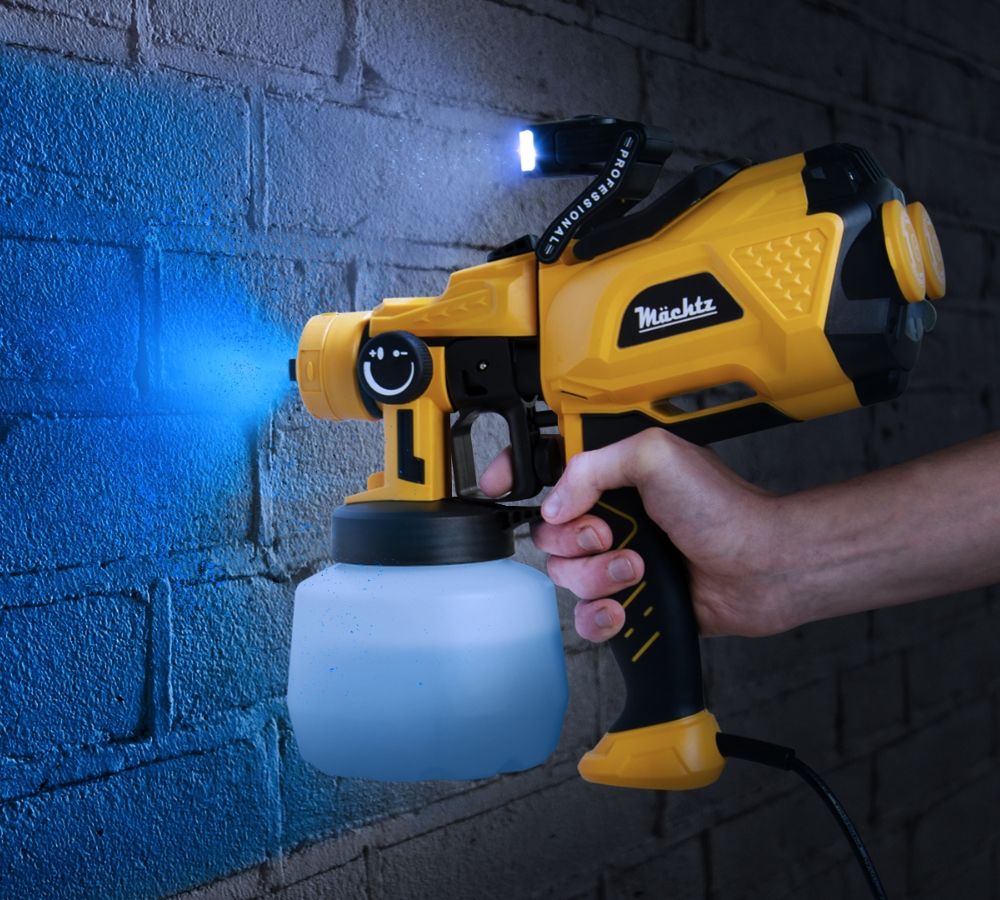 Покраска кирпичной стены краскопультом