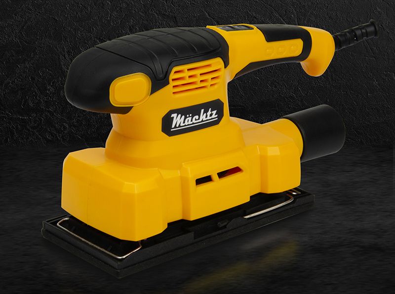 Шлифмашина на чёрном фоне